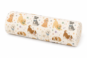 A cylindrical bolster pillow with a cream-colored fabric cover featuring a playful pattern of various dog breeds and paw prints, shown on a plain white background.