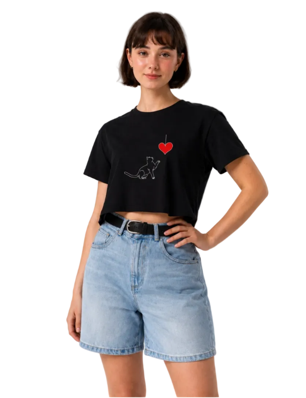 Person wearing a black t-shirt with a graphic design and light blue shorts on a white background