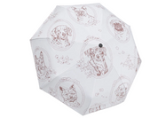A white folding umbrella with a repeating pattern of brown dog illustrations inside oval frames, shown against a plain white background.