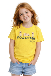 Child wearing a yellow 'Dog Sister' t-shirt with cartoon dogs on a white background