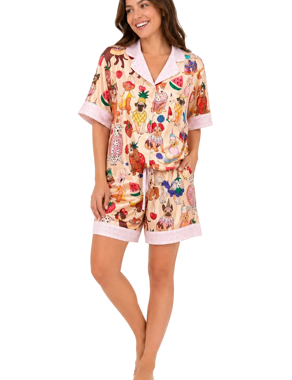 Woman wearing a colorful pajama set with cartoon characters on a white background