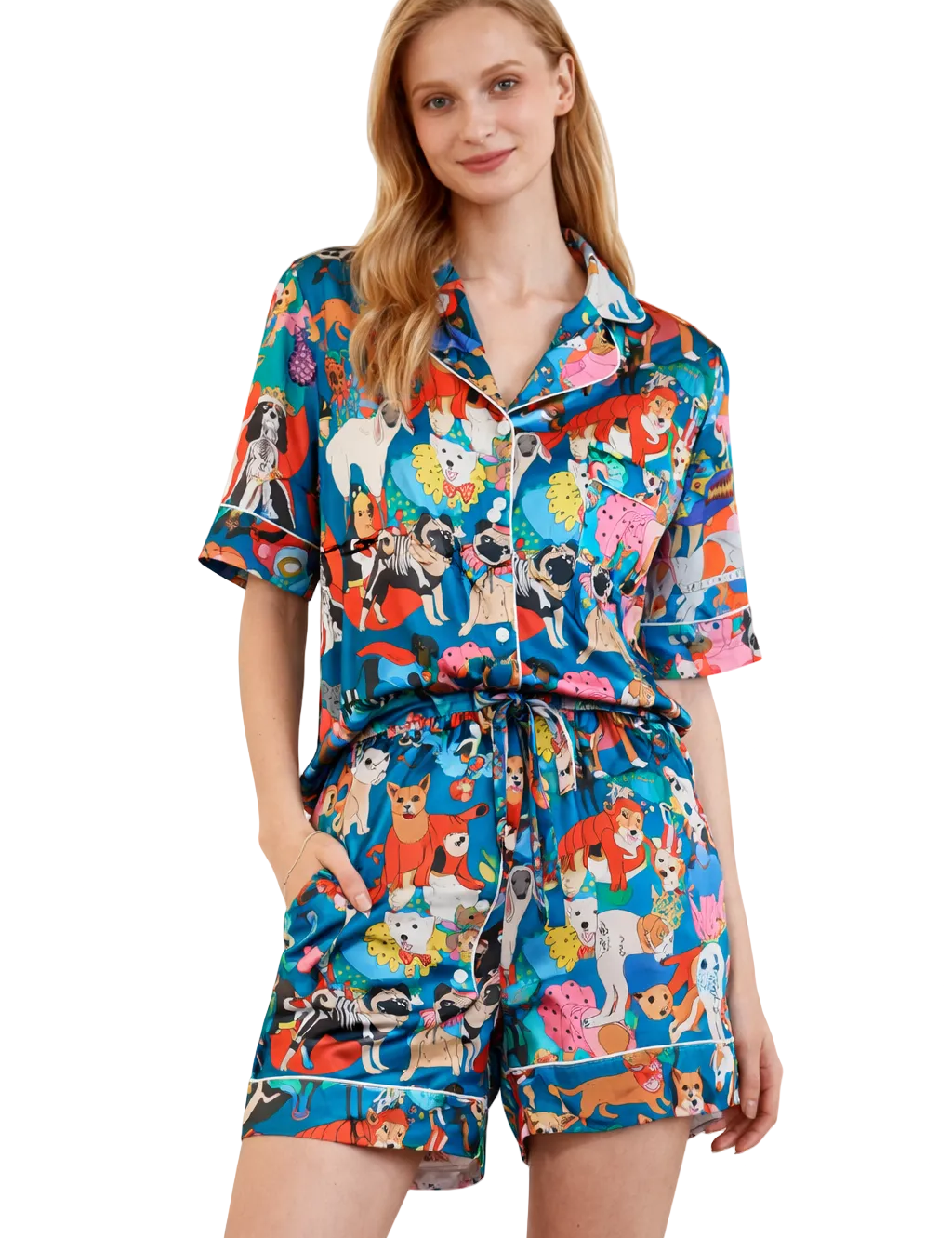 Woman wearing a colorful pajama set with animal print on a white background