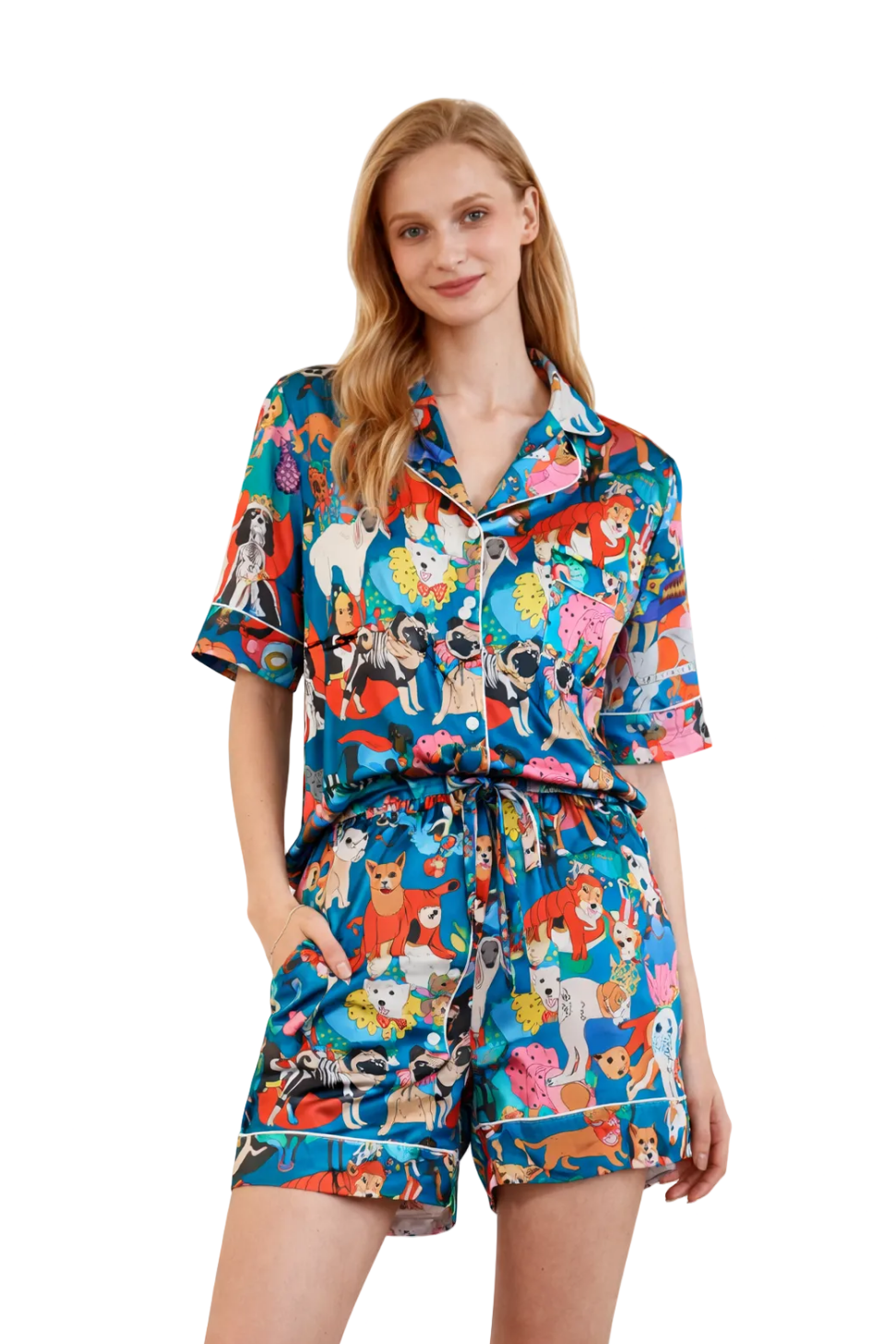 Woman wearing a colorful pajama set with animal print on a white background