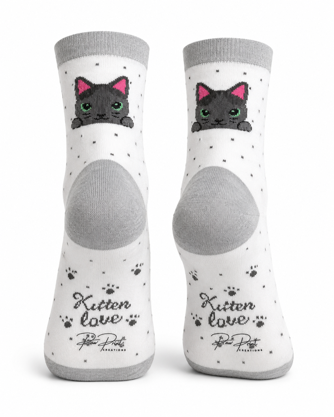 A pair of white crew socks with gray heels, toes, and cuffs, featuring a cute cartoon black kitten with pink ears peeking out, small black paw prints, and the text 'Kitten love Peter Pet' on the soles.