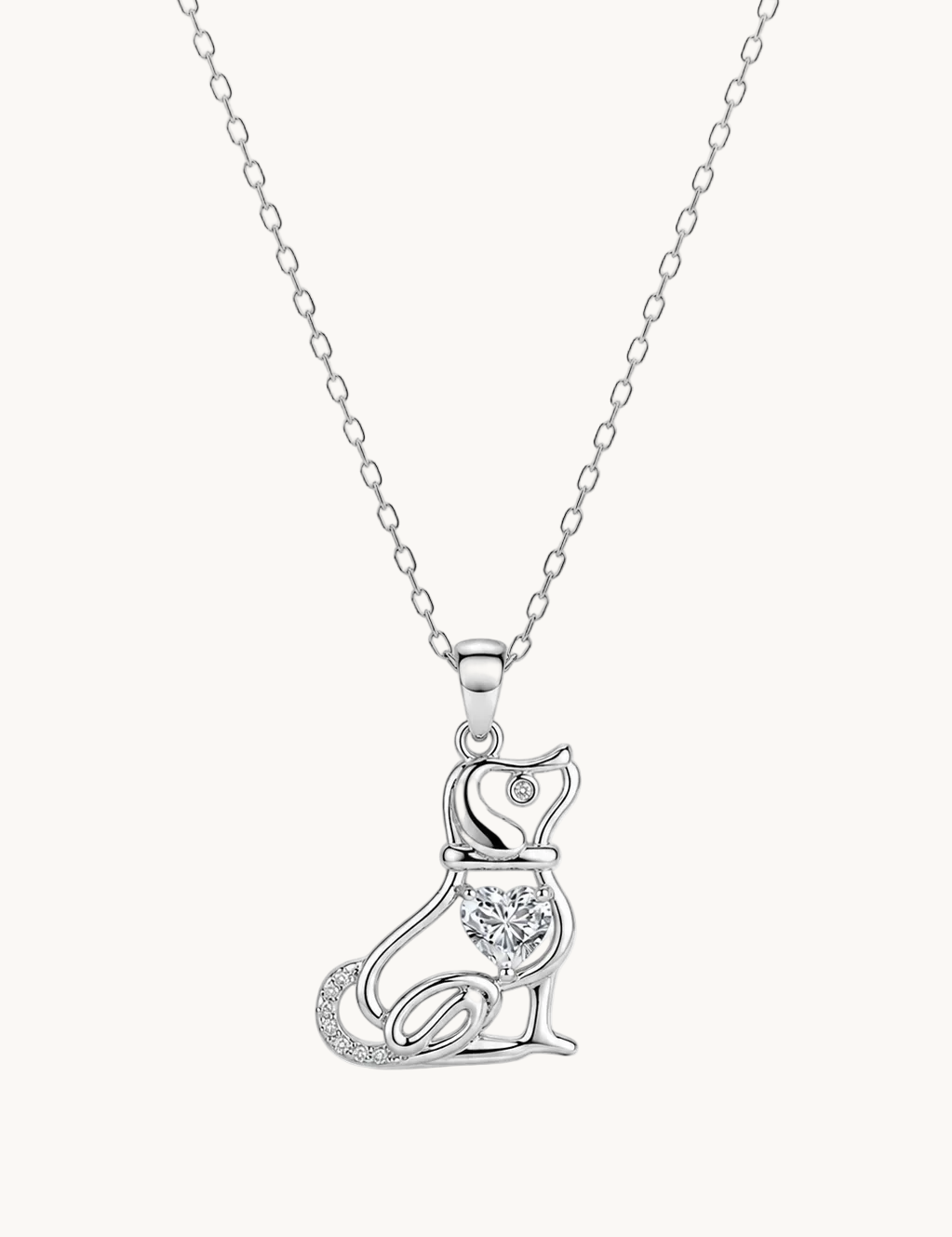 A silver pendant necklace featuring a stylized cat silhouette adorned with small clear stones, suspended from a delicate silver chain against a plain white background.