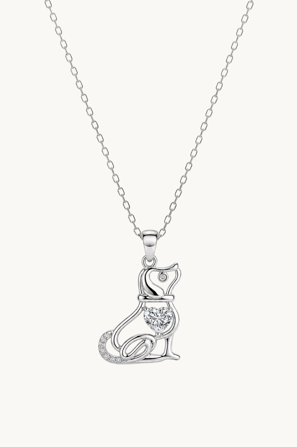 A silver pendant necklace featuring a stylized cat silhouette adorned with small clear stones, suspended from a delicate silver chain against a plain white background.