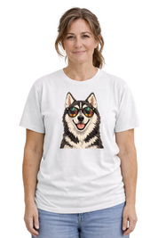 Woman wearing a white t-shirt with a dog graphic and sunglasses on a plain background