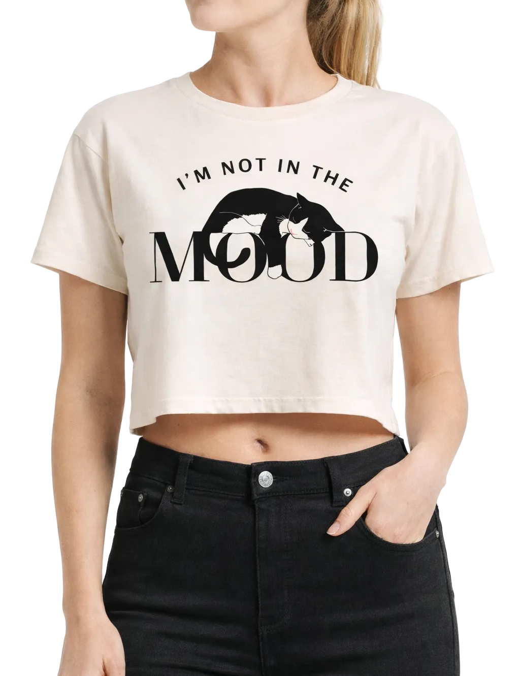 Woman wearing a white crop top with text and graphic design.