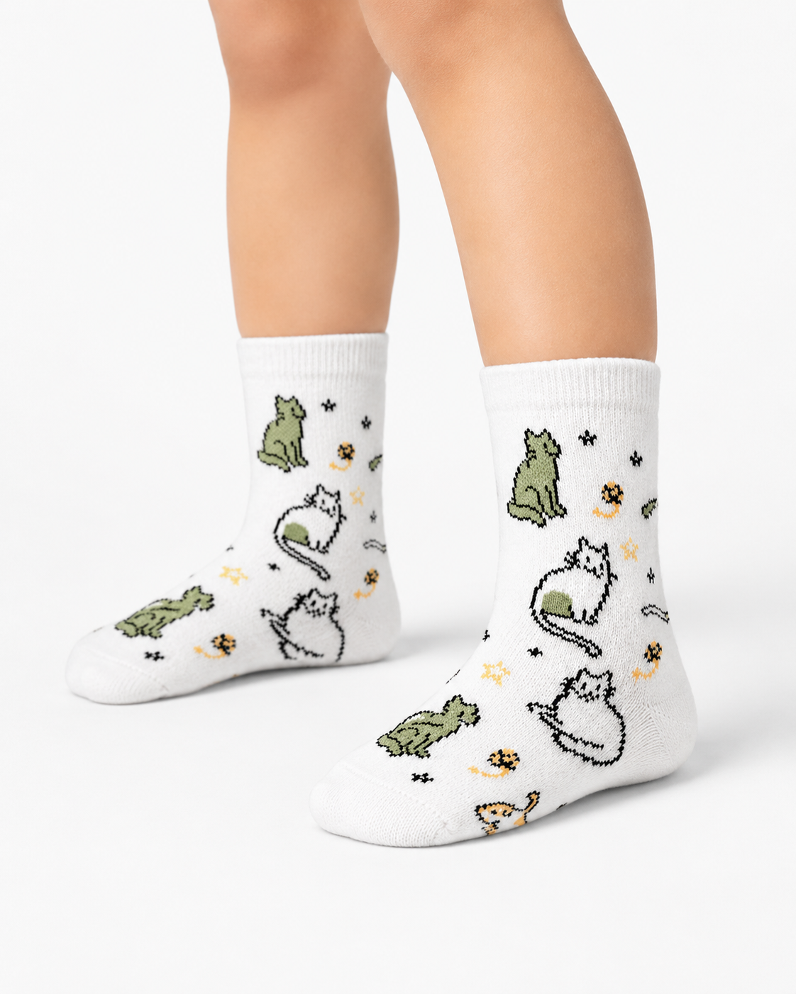 White socks with cat illustrations worn by a person on a white background