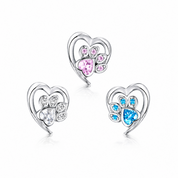 Heart-shaped earrings with gemstones on a white background