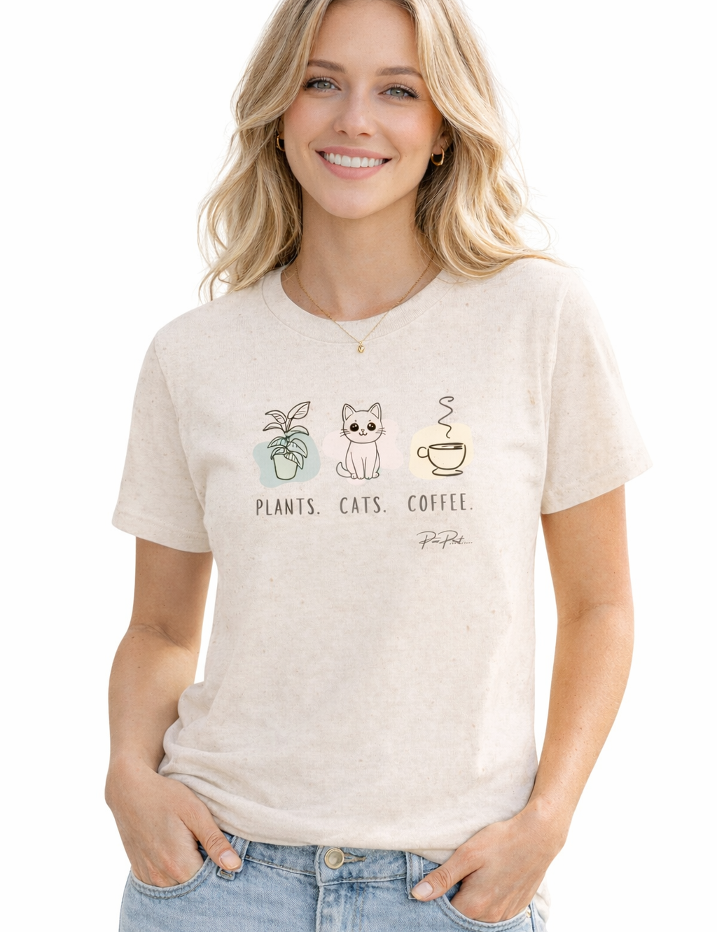 Woman wearing a beige t-shirt with graphics and text, standing against a white background