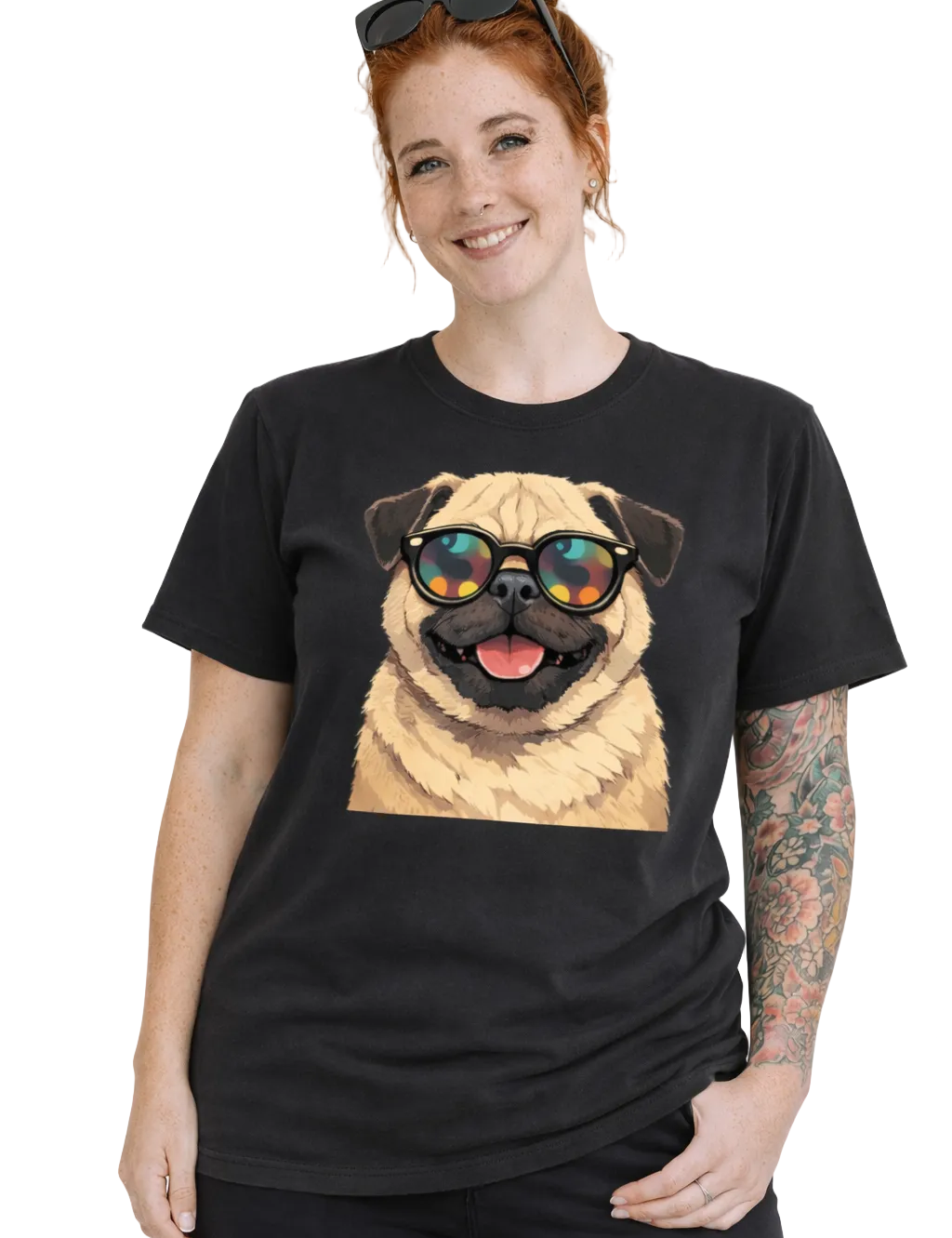 Person wearing a black t-shirt with a pug graphic and sunglasses on a light pink background