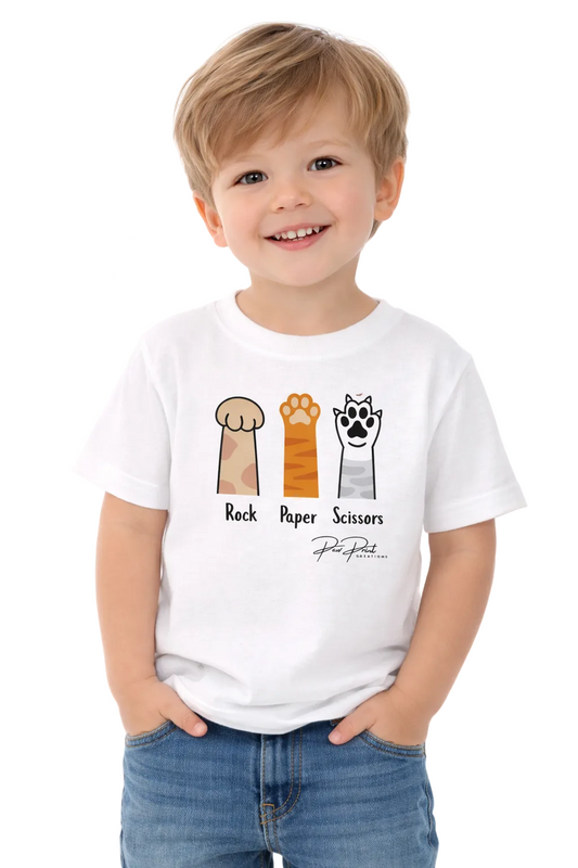 Child wearing a white t-shirt with paw prints and text on a white background